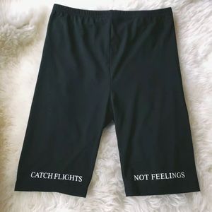 “Catch flights not feelings” biker shorts